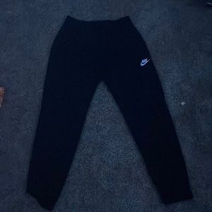 nike black pare of sweatpants